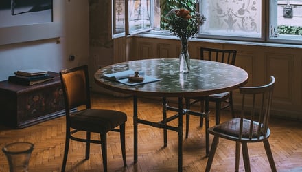 Why does laminate flooring need to acclimate?